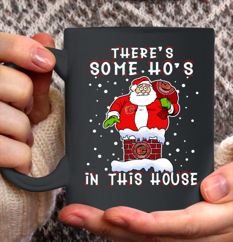 Calgary Flames Christmas There Is Some Hos In This House Santa Stuck In The Chimney NHL Ceramic Mug 11oz