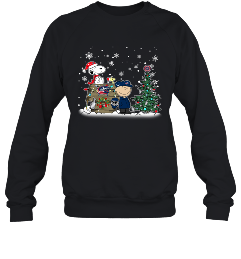 NHL Columbus Blue Jackets Snoopy Charlie Brown Woodstock Christmas Stanley Cup Hockey T Shirt RKKs6mDFYwx sweatshirt 35 95 151514 front black