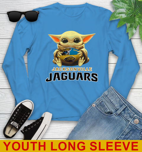 NFL Football Jacksonville Jaguars Baby Yoda Star Wars Shirt Youth Long Sleeve 9 NFL Football Jacksonville Jaguars Baby Yoda Star Wars Shirt Youth Long Sleeve - Image 9
