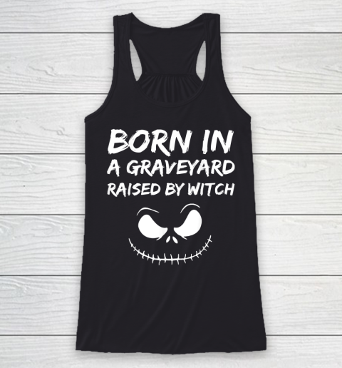 Born in a graveyard raised by a witch Racerback Tank