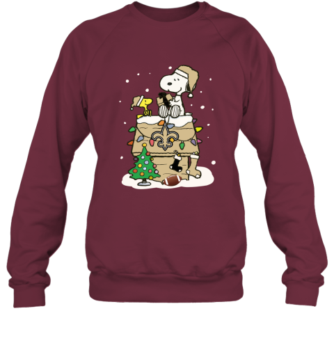 9flb a happy christmas with new orleans saints snoopy sweatshirt 35 front maroon