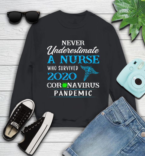 Nurse Shirt Never underestimate a nurse who survived 2020 T Shirt Sweatshirt
