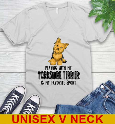 Playing with my yorkshire terrier is my favorite sport 43