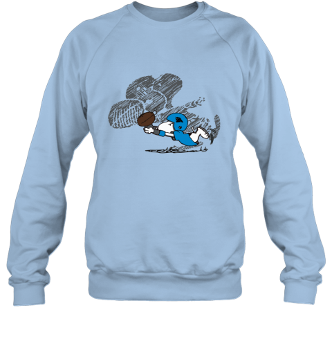 j9ca carolina panthers snoopy plays the football game sweatshirt 35 front light blue
