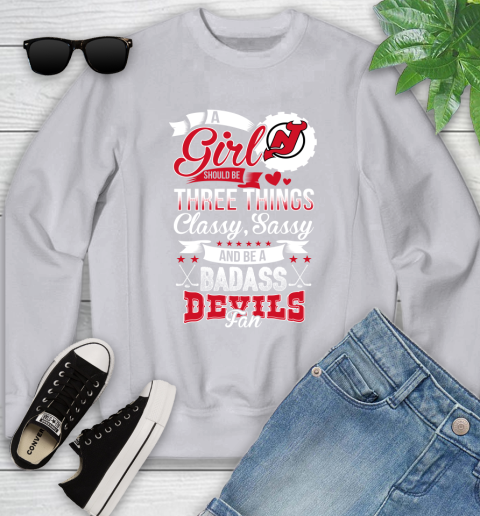 New Jersey Devils NHL Hockey A Girl Should Be Three Things Classy Sassy And A Be Badass Fan Youth Sweatshirt 3