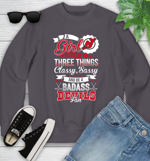 New Jersey Devils NHL Hockey A Girl Should Be Three Things Classy Sassy And A Be Badass Fan Youth Sweatshirt 5