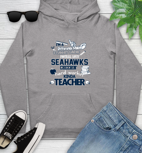 Seattle Seahawks NFL I'm A Difference Making Student Caring Football Loving Kinda Teacher Youth Hoodie 6