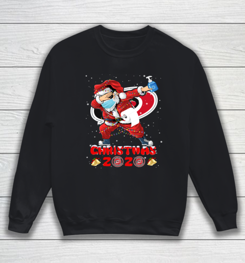 Carolina Hurricanes Funny Santa Claus Dabbing Christmas 2020 NHL Sweatshirt