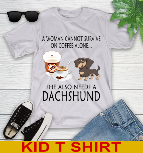 Women cannot survive on coffee alone she also need a DACHSHUND tshirt 86