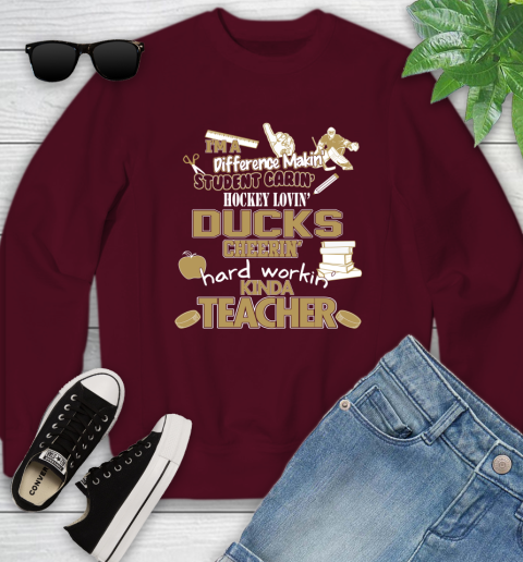 Anaheim Ducks NHL I'm A Difference Making Student Caring Hockey Loving Kinda Teacher Youth Sweatshirt 4