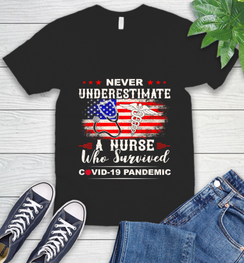Nurse Shirt Never underestimate a nurse who survived T Shirt V-Neck T-Shirt