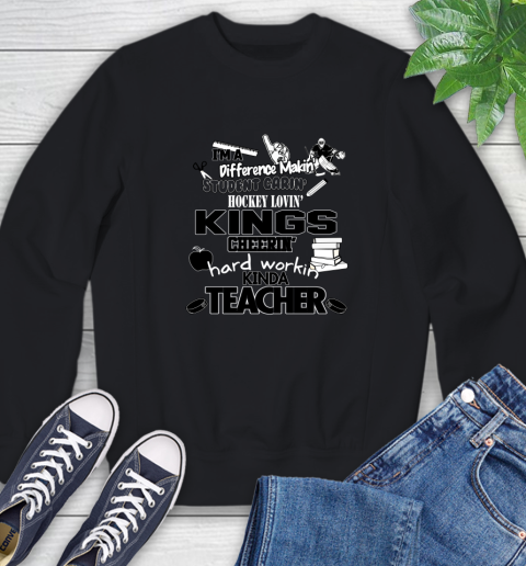 Los Angeles Kings NHL I'm A Difference Making Student Caring Hockey Loving Kinda Teacher Sweatshirt