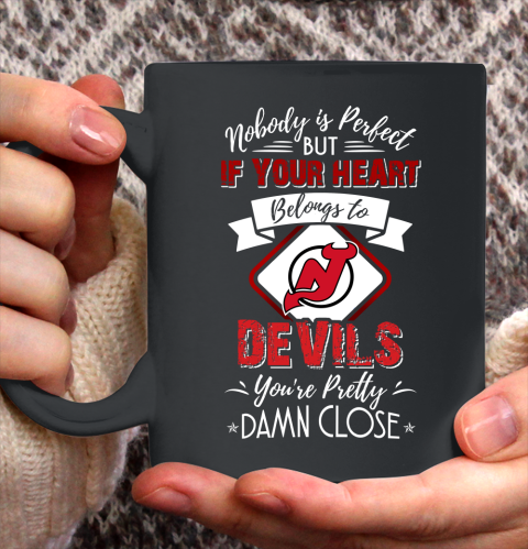 NHL Hockey New Jersey Devils Nobody Is Perfect But If Your Heart Belongs To Devils You're Pretty Damn Close Shirt Ceramic Mug 11oz