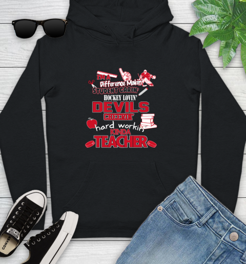 New Jersey Devils NHL I'm A Difference Making Student Caring Hockey Loving Kinda Teacher Youth Hoodie