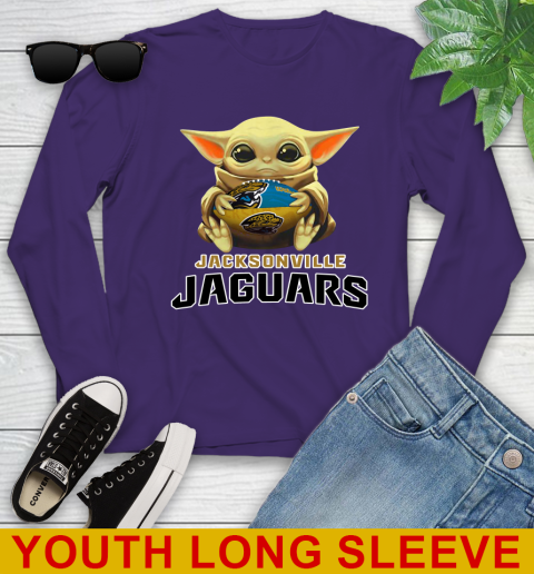 NFL Football Jacksonville Jaguars Baby Yoda Star Wars Shirt Youth Long Sleeve 6 NFL Football Jacksonville Jaguars Baby Yoda Star Wars Shirt Youth Long Sleeve - Image 6