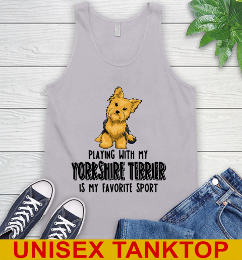 Playing with my yorkshire terrier is my favorite sport 58