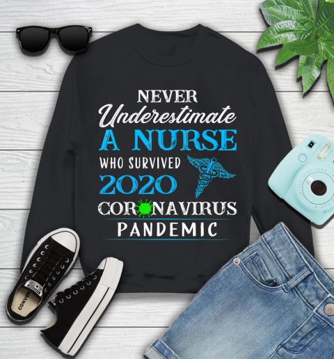 Nurse Shirt Never underestimate a nurse who survived 2020 T Shirt Youth Sweatshirt