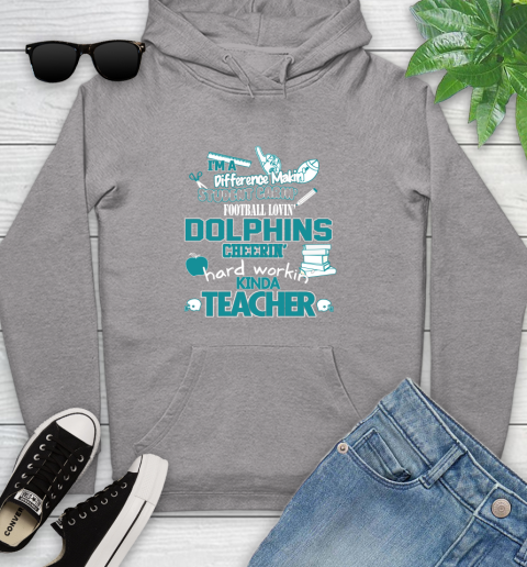 Miami Dolphins NFL I'm A Difference Making Student Caring Football Loving Kinda Teacher Youth Hoodie 6
