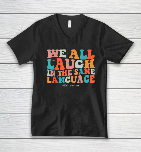 Groovy We All Laugh In The Same Language ESL Teachers V-Neck T-Shirt