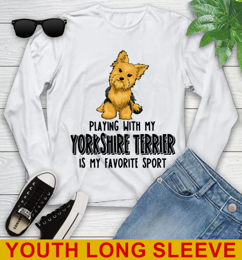 Playing with my yorkshire terrier is my favorite sport 102