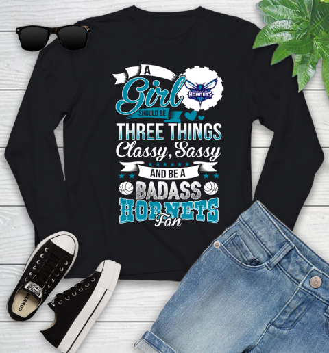 Charlotte Hornets NBA A Girl Should Be Three Things Classy Sassy And A Be Badass Fan Youth Long Sleeve